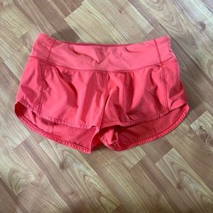 Orange lululemon speed up shorts 2.5